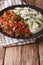 Mexican food ropa vieja: beef stew in tomato sauce with vegetables