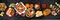 Mexican food table scene. Top down view on a dark stone banner background.