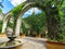 Mexican garden and colonial stone arc