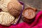 Mexican hot chocolate with sweet conchas bread on wooden background