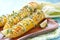 Mexican hot grilled corn cobs elote