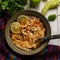 Mexican lime soup with chicken on white background