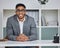 Mexican man, portrait and employee at desk, smile and confident account at finance firm. Male person, glasses and proud