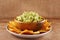 Mexican nachos with handmade guacamole sauce