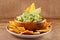 Mexican nachos with handmade guacamole sauce