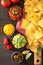 Mexican nachos tortilla chips with guacamole, salsa and cheese d