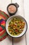 Mexican nopal cactus salad on white background