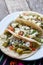 Mexican nopal cactus  tacos with cheese on wooden background