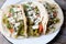 Mexican nopal cactus  tacos with cheese on wooden background