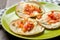 Mexican open faced quesadillas with `pico de gallo` sauce and Oaxaca cheese