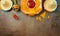 Mexican party table with nacho chips, maracas and sombrero hat on dark background. Cinco de Mayo holiday celebration. Top view,