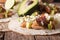 Mexican Pork carnitas with onions and avocado close-up. horizontal