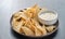 Mexican queso blanco cheese dip with corn tortilla chips