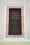 Mexican Rustic Colonial window with bars and metal mesh