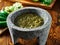 Mexican salsa verde in traditional stone molcajete