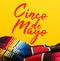 Mexican Serape blanket on yellow background with Cinco de Mayo.