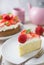 Mexican soaked cake topped with strawberries and cream