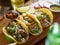 Mexican street tacos with barbacoa, carnitas and ChicharrÃ³n