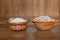 Mexican style clay containers with rice grains and beans