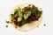 Mexican tacos with beef, tomatoes, avocado, chilli and onion