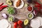 Mexican tacos ingredients on rustic wooden table