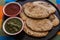 Mexican tlacoyos with green and red sauce, Traditional food in Mexico