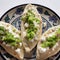 Mexican tlacoyos with green sauce on white background