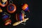 Mexican toys from Wooden, balero, yoyo and trompo in Mexico on black background