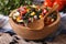 Mexican vegetable salad on plate closeup and ingredients horizon