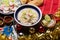 Mexican white  pozole with christmas decoration on wooden background