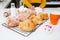 Mexican woman baking Pan de Muerto traditional bread from Mexico in Halloween