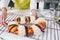 Mexican woman baking a traditional rosca de reyes or epiphany cake on the oven in kitchen at home for Kings Day in Mexico Latin Am