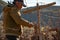 Mexican worker trimming wine crops in Valle de Guadalupe