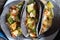 Mexican zucchini stew  tacos with blue tortilla