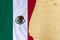 Mexico country colored silk national flag, empty wooden mocap for text, concept of tourism, travel, emigration, global business,