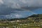 Mexico country landscape, a rainbow appearing on the horizon in front of a hill 2.