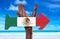 Mexico Flag wooden sign with a beach on background