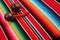 Mexico poncho serape maracas Mexican traditional cinco de mayo rug poncho fiesta background with stripes