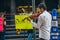 MEXICO - SEPTEMBER 20: young adults playing performing with violins on the street to gather money for the earthquake victims