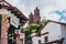 MEXICO - SEPTEMBER 22: Towers of the Taxco Cathedral and traditional white and red buildings, September 22, 2017 in Taxco, Mexico