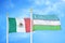Mexico and Uzbekistan two flags on flagpoles and blue cloudy sky