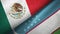 Mexico and Uzbekistan two flags textile cloth, fabric texture