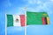 Mexico and Zambia two flags on flagpoles and blue cloudy sky