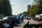 Mezhigorye,Kiev - September, 28, 2019: Cars and buses are parked at the entrance to the Mezhigorye park