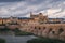 The Mezquita Cathedral in Cordoba, cityscape with the Roman bridge in foreground, Cordoba, Spain