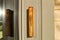 Mezuzah. Religious attribute at the entrance to a house. Large Decorative Mezuzah at the entrance to a modern residential building