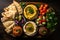 Mezze platter dish top-down view, an assortment of hummus, olives, falafel, and warm pita bread, generative ai