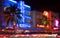 Miami Beach, Florida illuminated hotels and restaurants at night on Ocean Drive