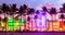 Miami Beach Ocean Drive hotels and restaurants at sunset. City skyline with palm trees at night. Art deco nightlife on