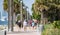 Miami Beach street scene old ladies wearing face masks to stop spread of Covid 19 Coronavirus